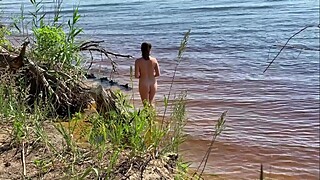 Spy sexy nudist girl on a wild beach